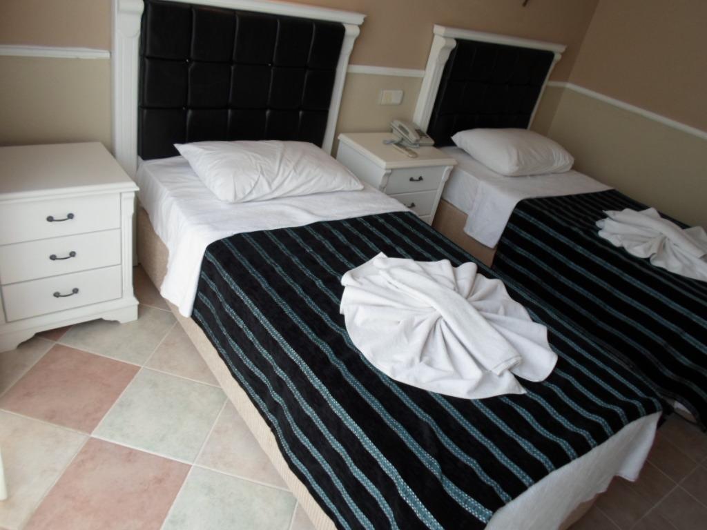 Hotel Hani Armutalan Habitación foto