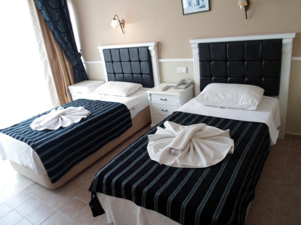 Hotel Hani Armutalan Habitación foto