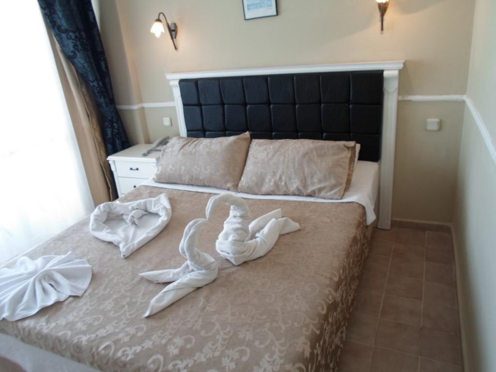 Hotel Hani Armutalan Habitación foto